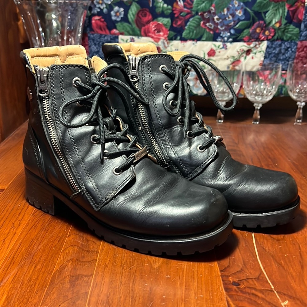 Harley-Davidson woman’s size 9 black leather boots.